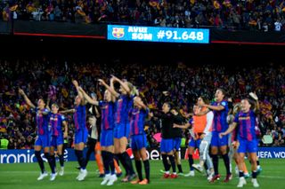 Barcelona Women celebrate at the Camp Nou after beatign Wolfsburg