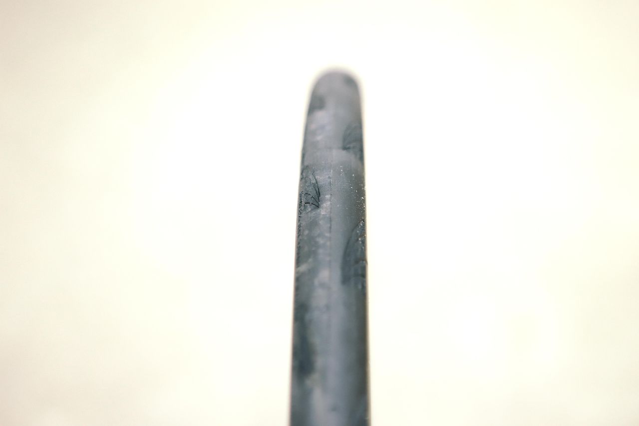 a close up of a black road bike tyre