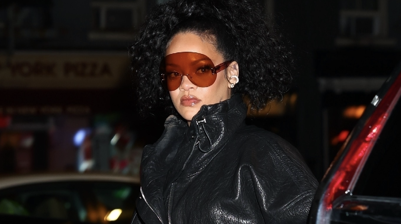 Rihanna was seen celebrating New Year’s Eve at a cozy local bar in New York City wearing a leather jacket and boots with a bottega veneta bag