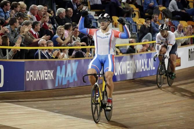 Russia&rsquo;s Denis Dmitriev celebrates his victory