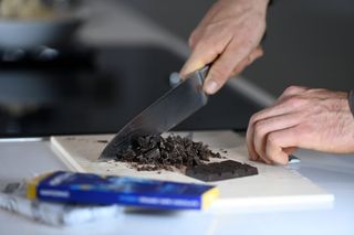 Image shows a rider making chocolate protein bars.