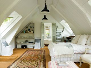loft bedroom with wooden floor