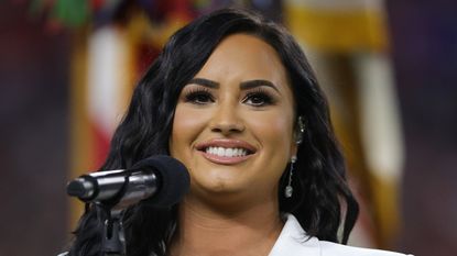Singer Demi Lovato performs the national anthem prior to Super Bowl LIV between the San Francisco 49ers and the Kansas City Chiefs at Hard Rock Stadium on February 02, 2020 in Miami, Florida.