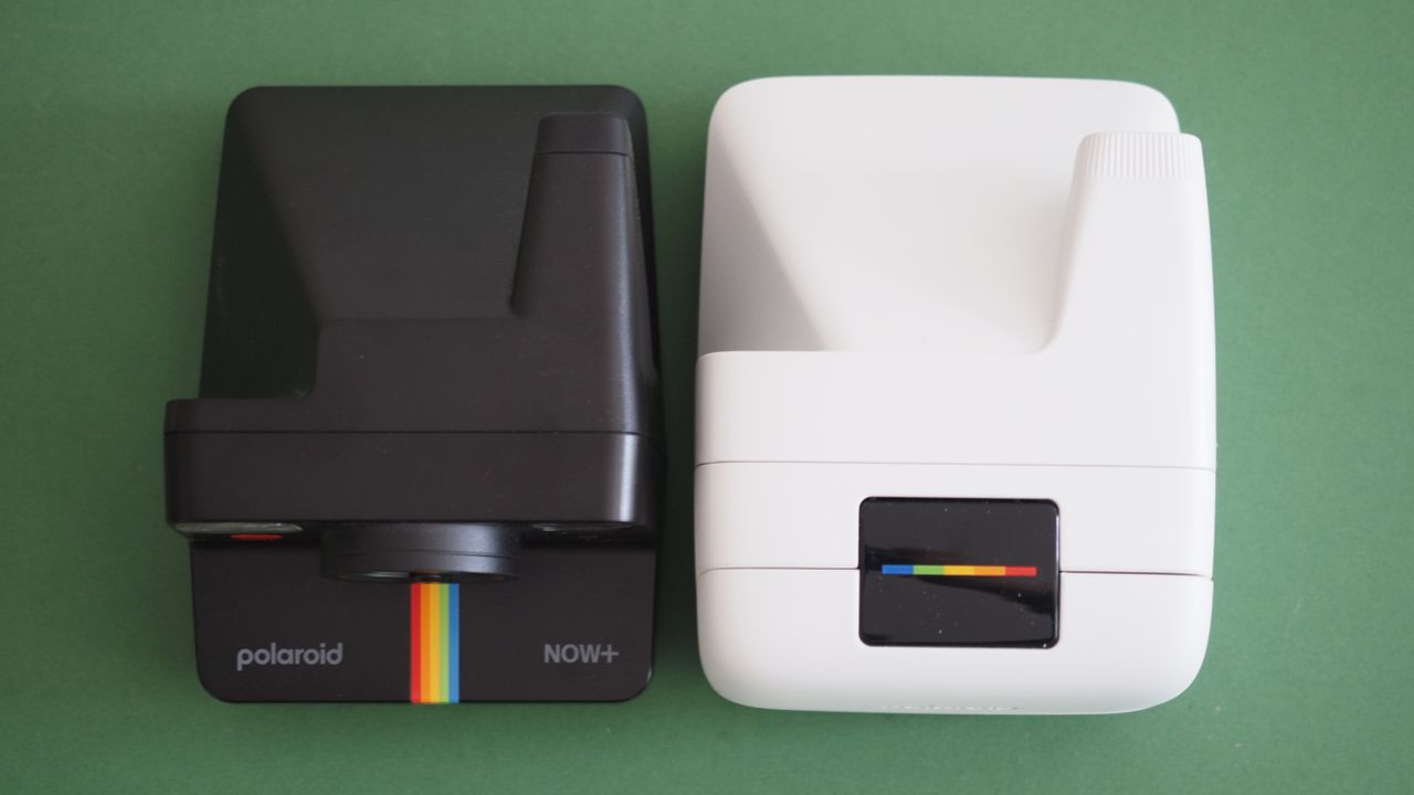 Polaroid Now+ Gen 2 next to a Polaroid Flip, on a green surface