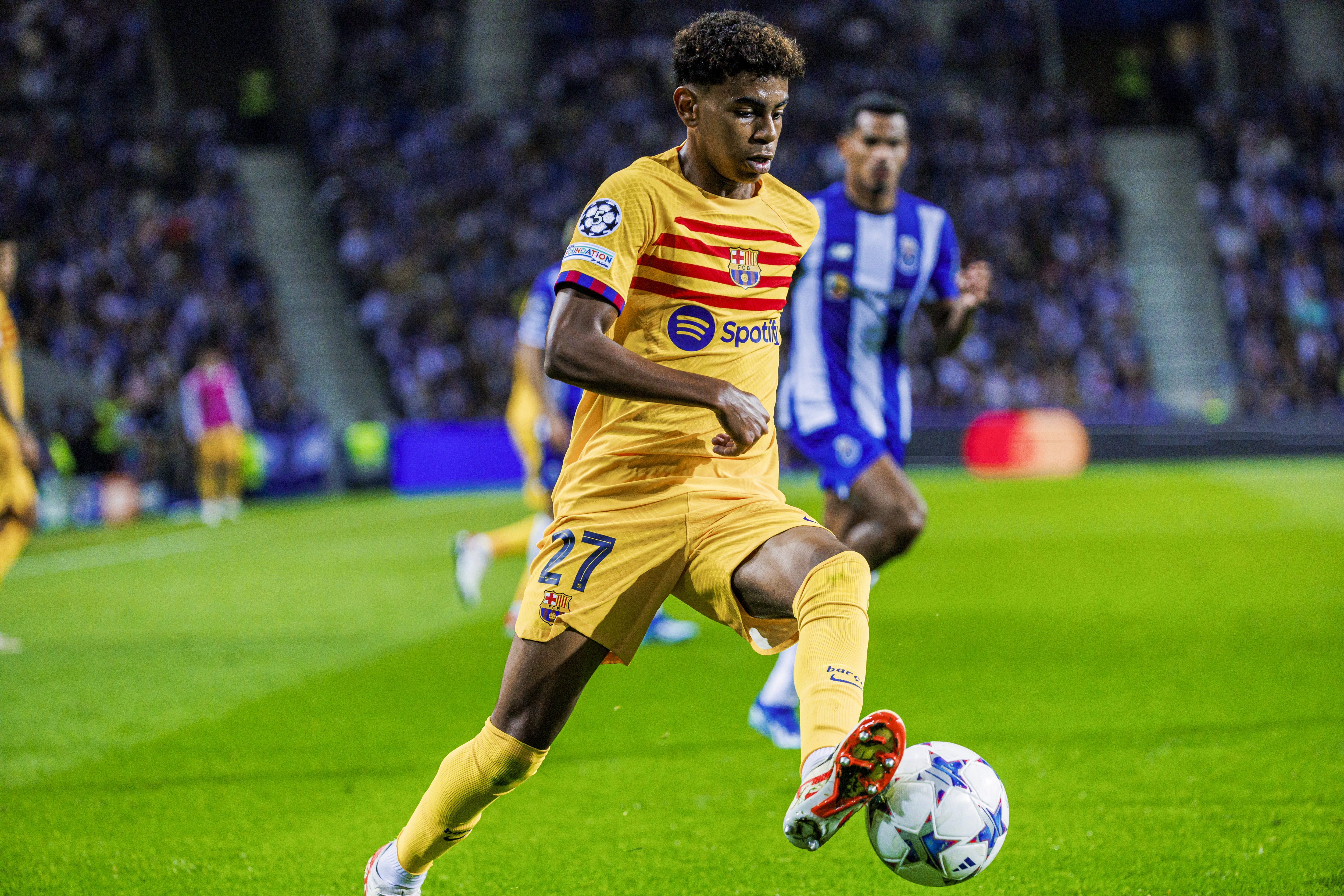 Lamine Yamal on the ball for Barcelona against Porto in the Champions League in October 2023.