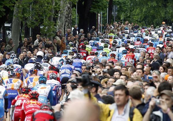 The peloton rolls out of Novara at the start of stage five.