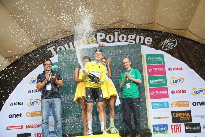 Petr Vakoc (Omega Pharma - QuickStep) opens a bottle of champagne on the stage 4 podium