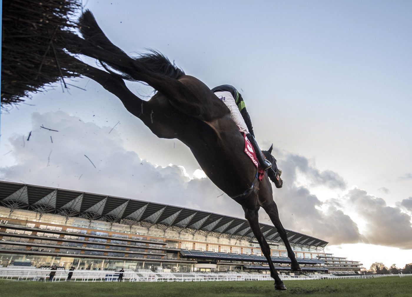First Flow &amp;amp; David Bass land over the last fence on way to winning. 3:35 Matchbook Betting Exchange Clarence House Chase (Grade 1). &amp;copy;George Selwyn 07967 030722 email: george@georgeselwyn.co.uk