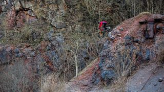 Freeride mountain biker Sam Pilgrim attempts a gnarly descent