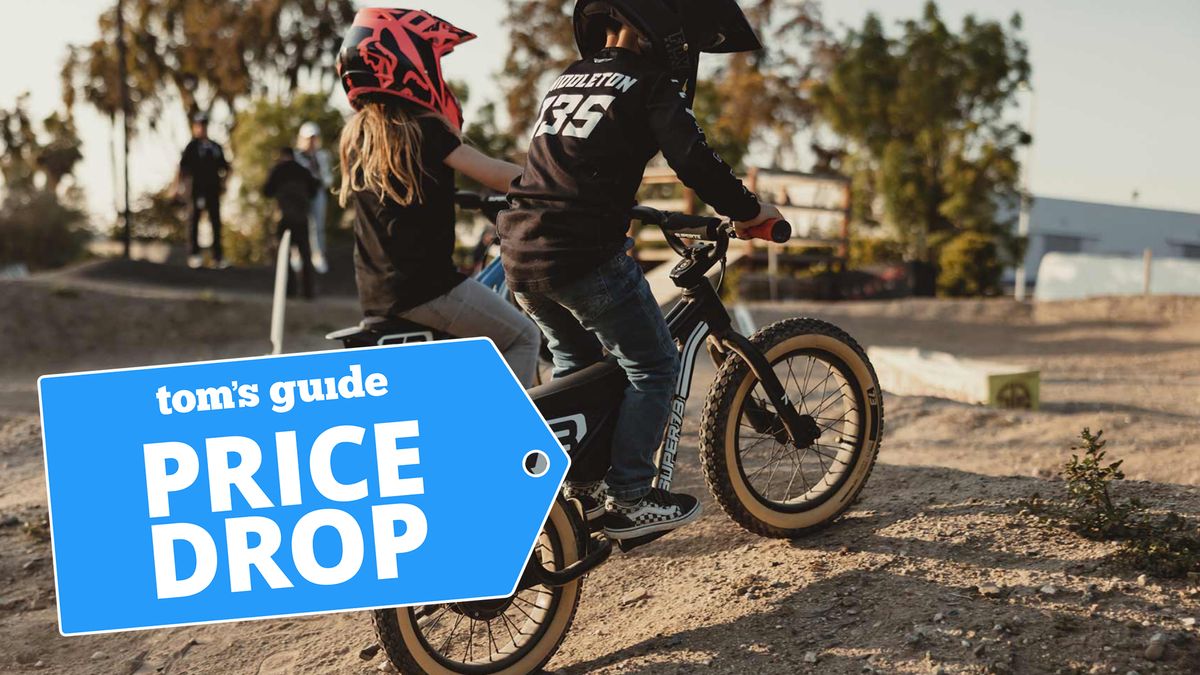 Two children riding SUPER73 bikes