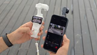 Honor robot phone next to Insta360 Luna Ultra