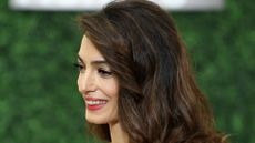 Amal Clooney, the wife of actor George Cloony, attends a reception for the 2022 Kennedy Center honorees at the White House on December 04, 2022 in Washington, DC. This year's honorees include actor and filmmaker George Clooney; singer-songwriter Amy Grant; singer Gladys Knight; composer Tania León; and Irish rock band U2, comprised of band members Bono, The Edge, Adam Clayton, and Larry Mullen Jr.