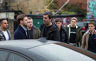 Cain Dingle is surrounded by Isaac and his crew, who attacked Matty Barton on New Year's Eve