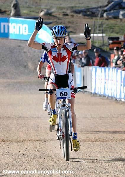 Catharine Pendrel crosses with two seconds to spare to take the silver.