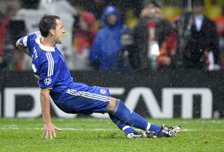 Chelsea defender John Terry slips as he takes a penalty and misses in the shootout against Manchester United in the 2008 Champions League final.