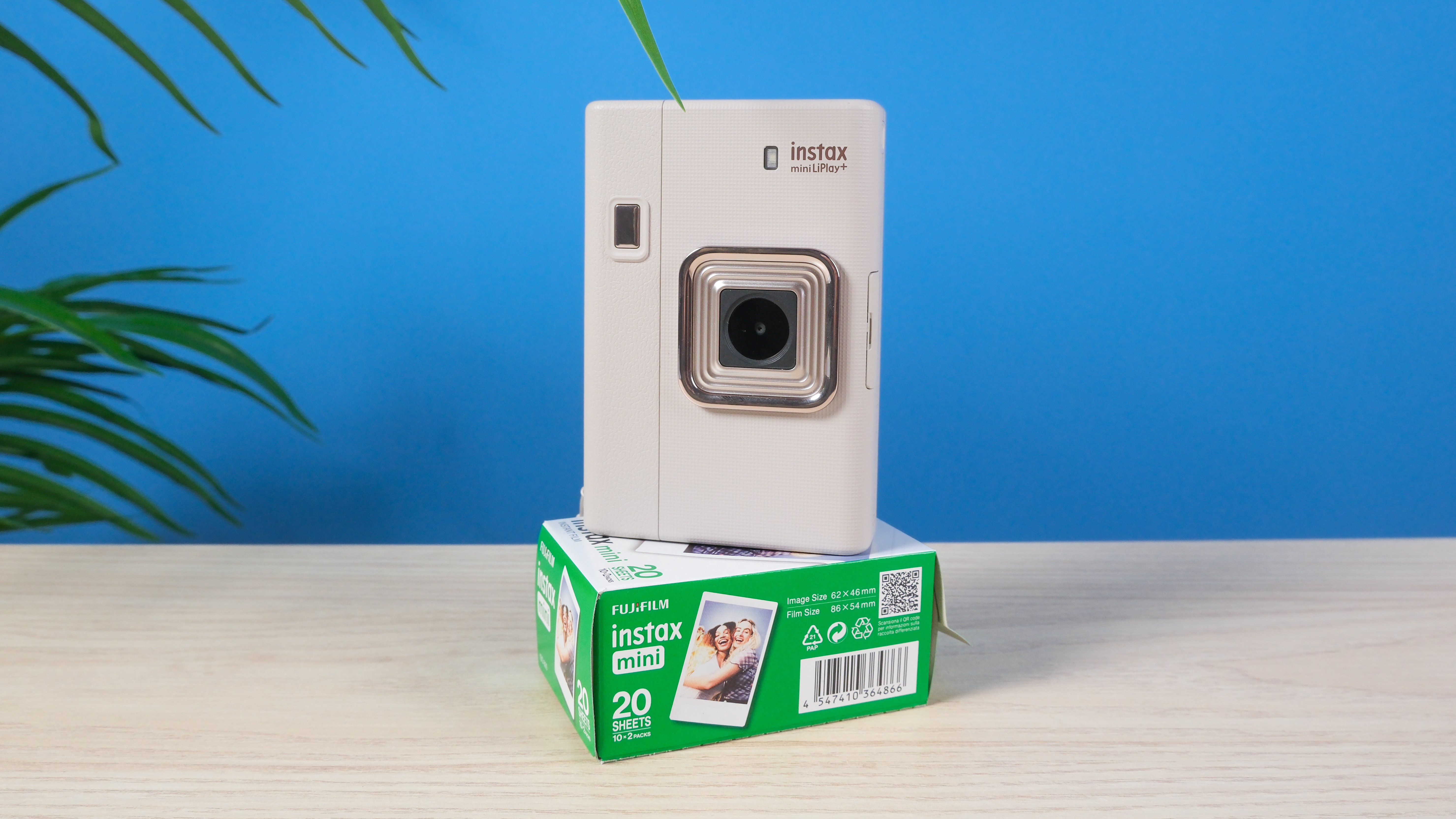 A Sand Beige Fujifilm Instax mini LiPlay Plus hybrid instant camera