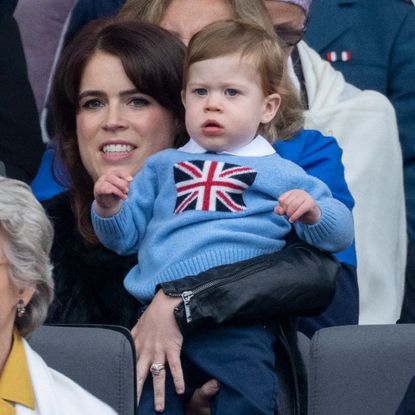 Princess Eugenie and Jack Brooksbank with August Philip Hawke Brooksbank attend the Platinum Pageant on The Mall on June 5, 2022 in London, England. The Platinum Jubilee of Elizabeth II is being celebrated from June 2 to June 5, 2022, in the UK and Commonwealth to mark the 70th anniversary of the accession of Queen Elizabeth II on 6 February 1952.