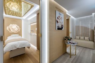 Dior Prestige La Suite at Harrods, London with treatment bed and Dior skincare products