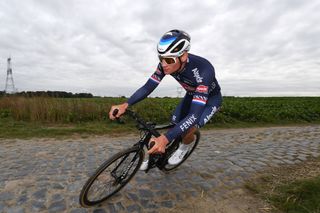 WALLERS FRANCE OCTOBER 01 Mathieu Van Der Poel of Netherlands and Team AlpecinFenix passing through cobblestones sector during the 118th ParisRoubaix 2021 Training Day 2 ParisRoubaix on October 01 2021 in Wallers France Photo by Tim de WaeleGetty Images