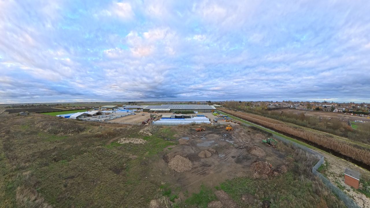 A photo of fields and an industrial site captured with the Antigravity A1 drone