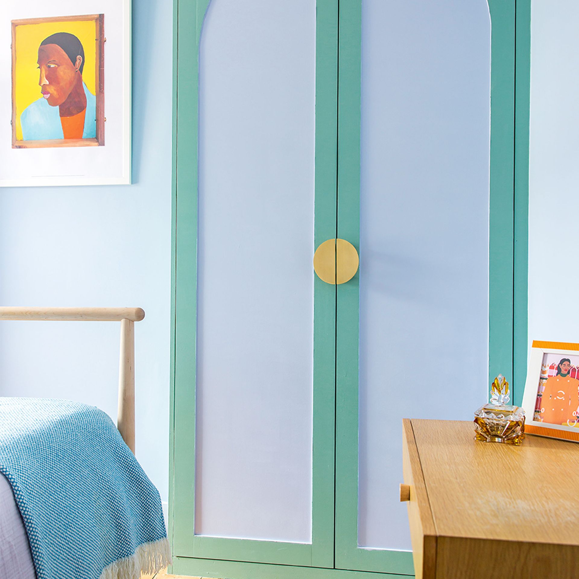 green bedroom with painted wardrobe