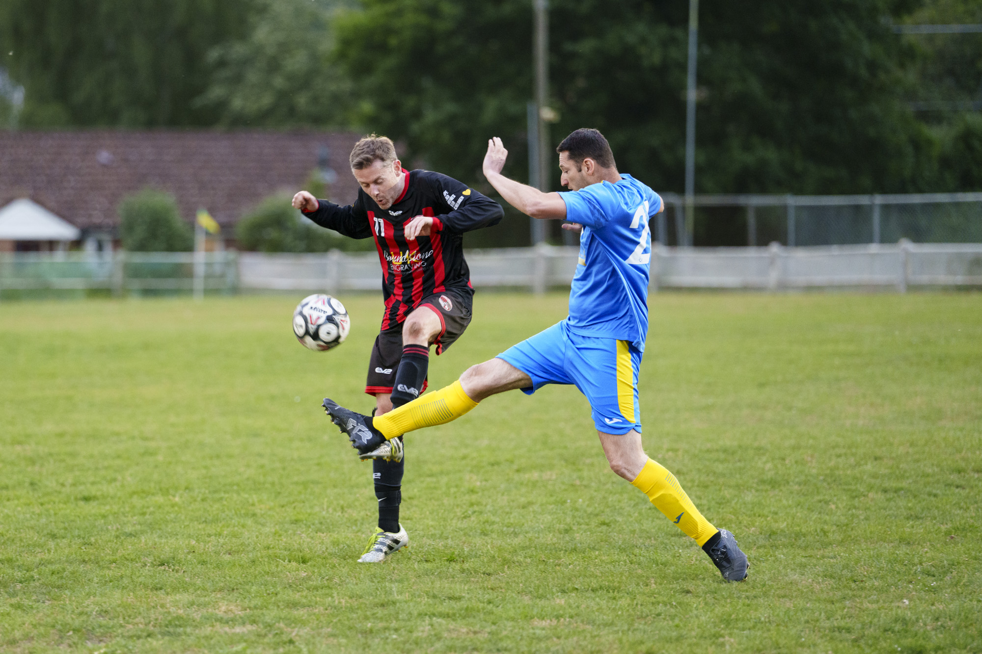 Soccer players in action, taken with the Sony FE 50-150mm F2 GM lens