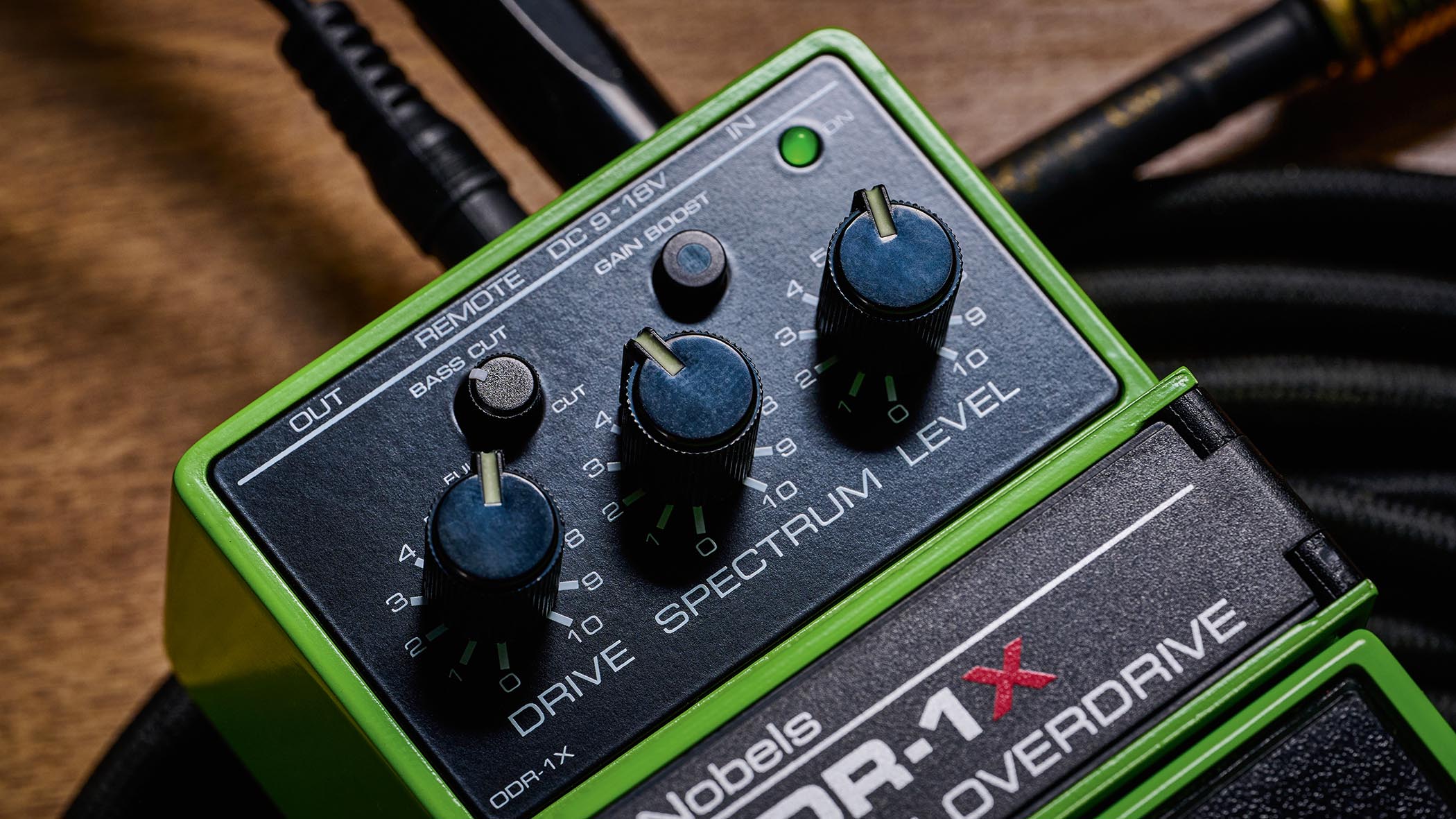 Nobels ODR-1X: the latest iteration of the &quot;other&quot; classic green drive pedal is pictured ontop of a coiled guitar cable.