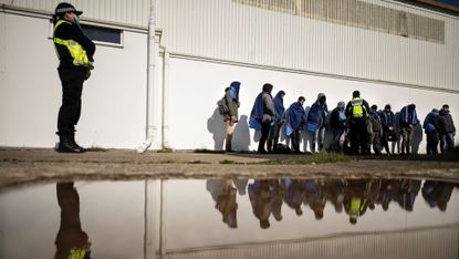 Waiting refugees, picked up at sea attempting to cross the Channel