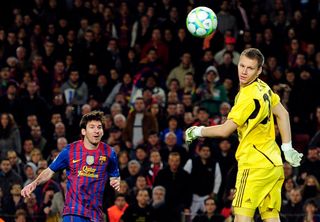 Lionel Messi of Barcelona scores one of his five goals against Bayer Leverkusen during the Champions League last 16 second leg match at the Camp Nou, March 2012