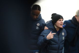 Sonia Bompastor, Head Coach of Chelsea speaks to her players following the Barclays Women's Super League match between Chelsea and Manchester United at Kingsmeadow on November 24, 2024 in Kingston upon Thames, England.