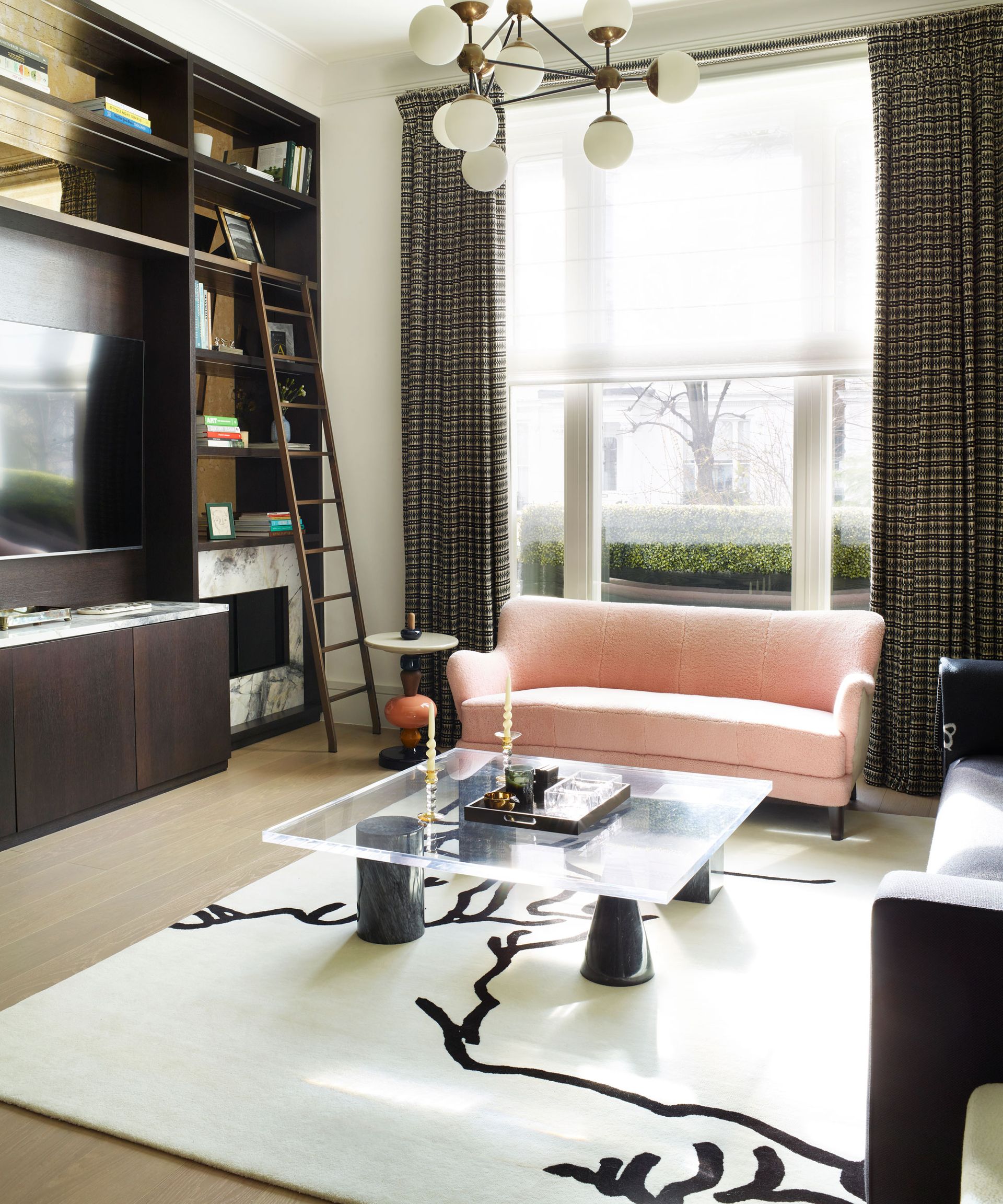living room with couch, rug and coffee table