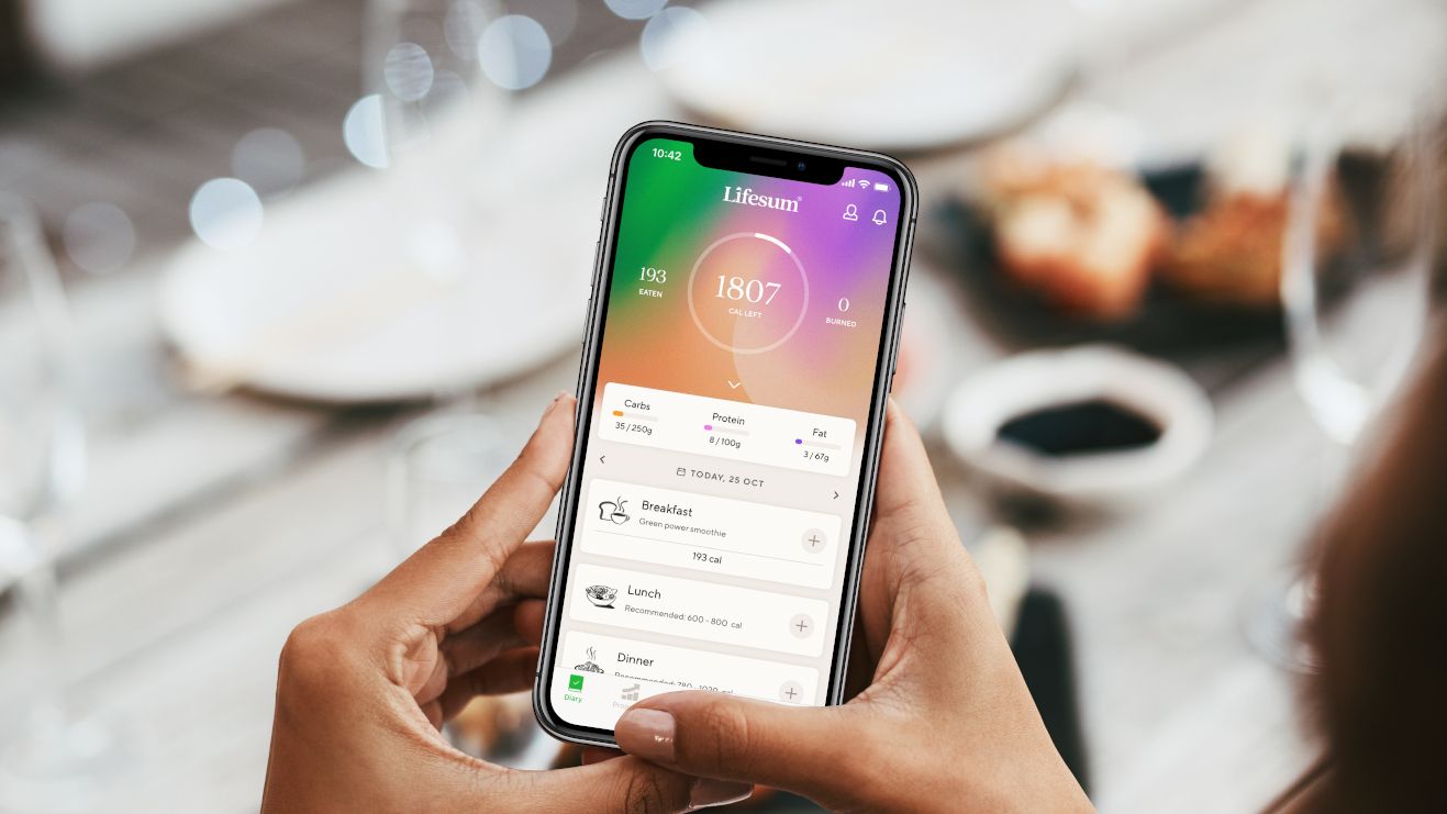 Someone using the Lifesum app to check their calorie intake