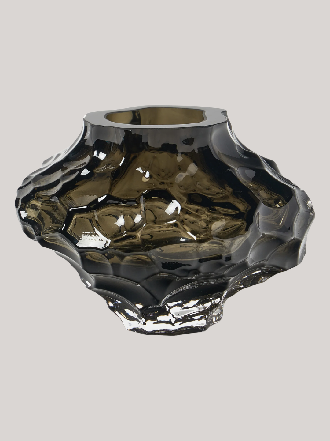 A green textured glass vase