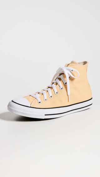 light yellow Converse high-top sneakers