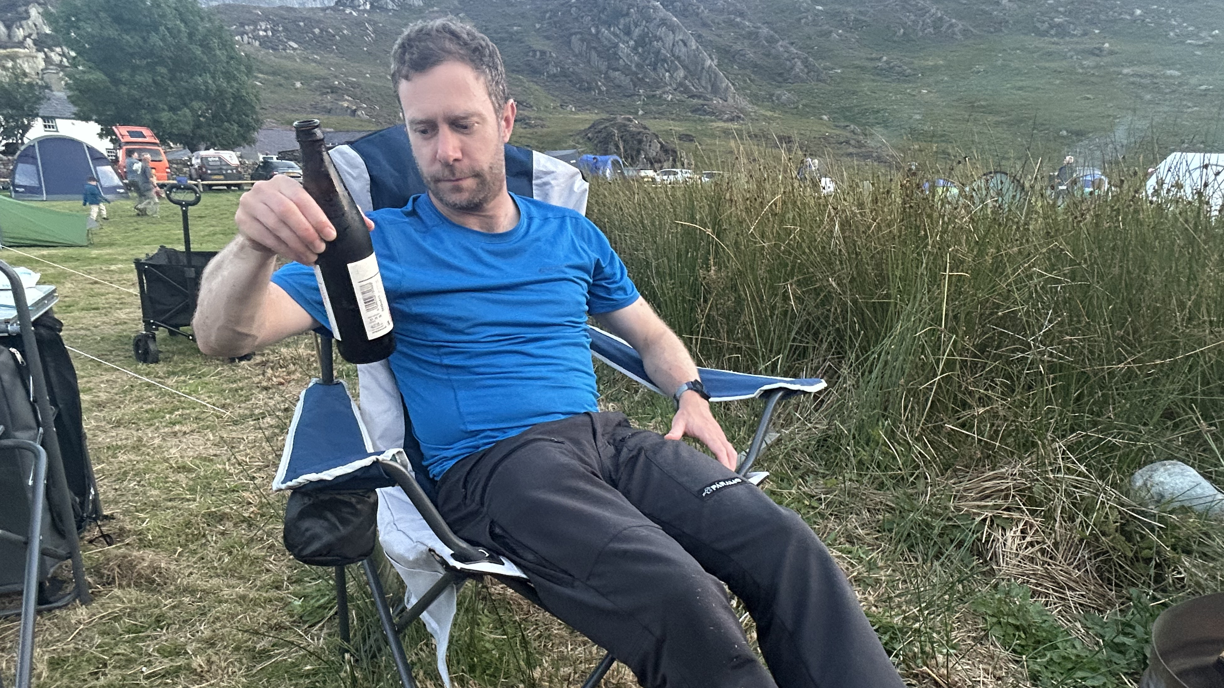 Alex enjoying a beer on the Trail Falcon Padded Camping chair