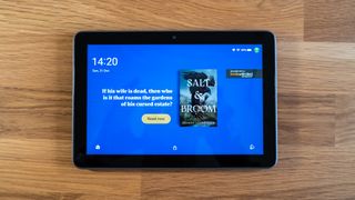 Amazon Fire HD 8 Plus screen on a wooden surface