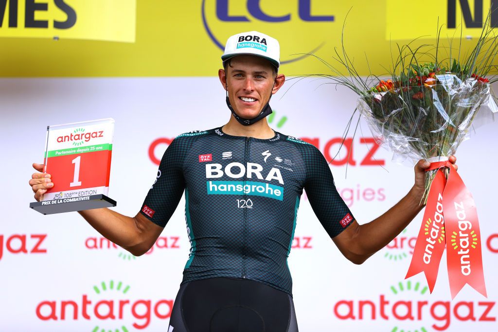NMES FRANCE JULY 08 Nils Politt of Germany and Team BORA Hansgrohe stage winner celebrates at podium during the 108th Tour de France 2021 Stage 12 a 1594km stage from SaintPaulTroisChateaux to Nimes LeTour TDF2021 on July 08 2021 in Nmes France Photo by Tim de WaeleGetty Images