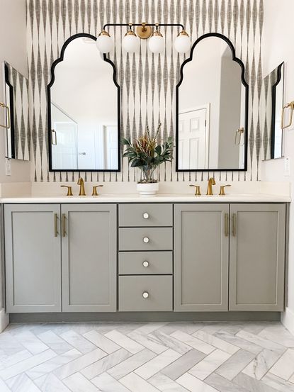 updated bathroom with wallpaper and gray vanity brooke waite