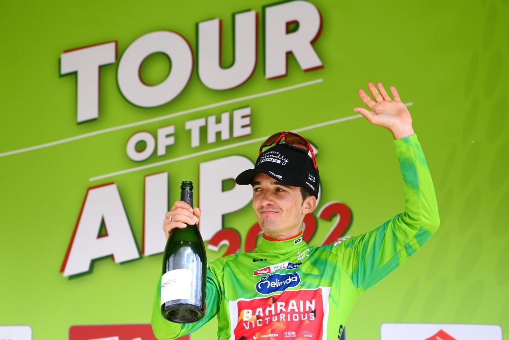 LIENZ AUSTRIA APRIL 21 Pello Bilbao Lpez De Armentia of Spain and Team Bahrain Victorious celebrates winning the green leader jersey on the podium ceremony after the 45th Tour of the Alps 2022 Stage 4 a 1424km stage from Villabassa to Kals am Grossglockner 1336m TouroftheAlps on April 21 2022 in Lienz Austria Photo by Tim de WaeleGetty Images