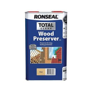 A blue tin of Ronseal wood preserver with pictures of different wood types on the front