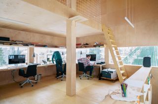 timber clad interior at live work student space in Moscow designed by DROM