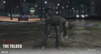 A screenshot from "Tenderloin Night Shift" depicting a zombie named "The Folded."