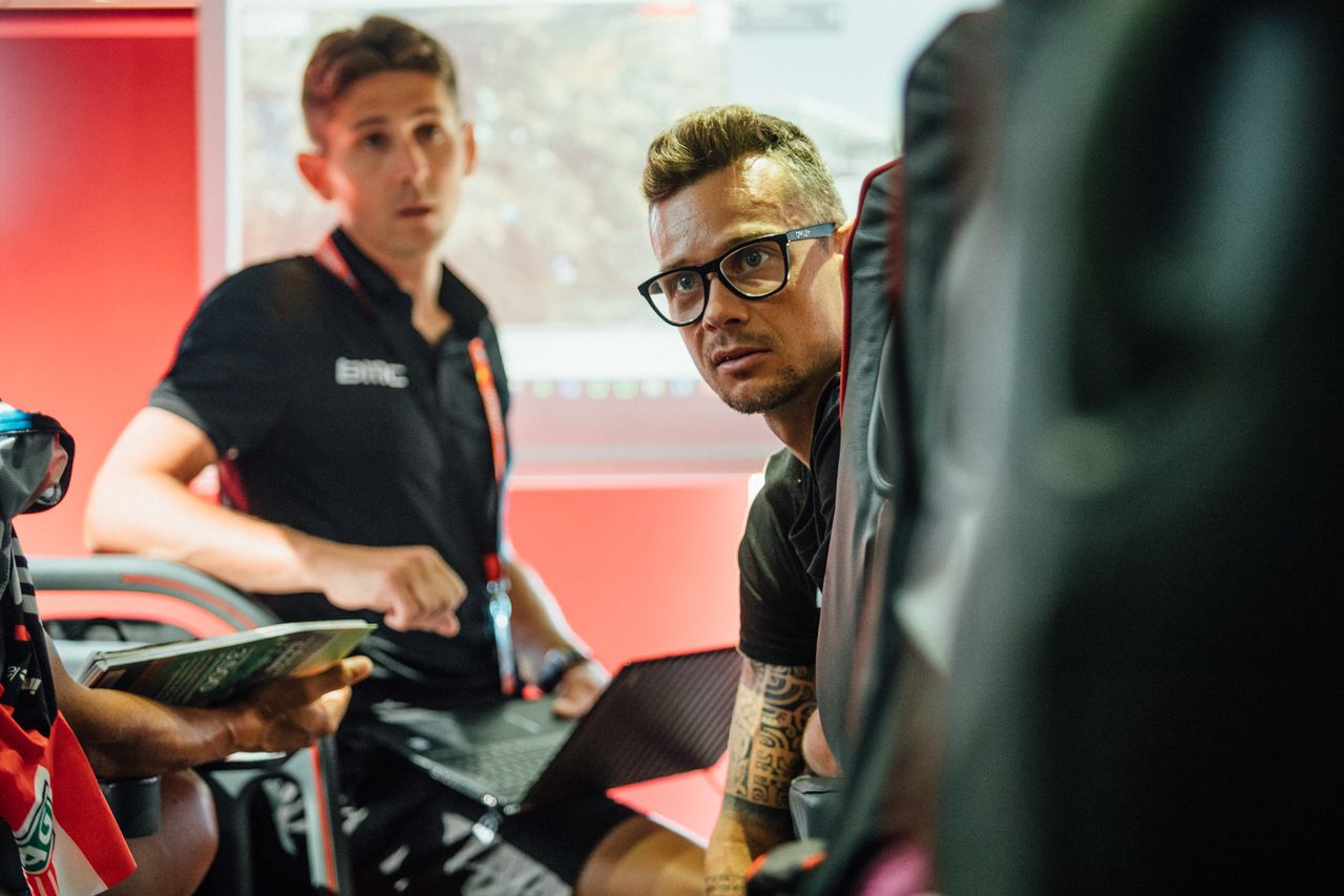 Nicolas Roche discusses tactics with the rest of the BMC team at the start of stage 4 of the Vuelta a Espana.