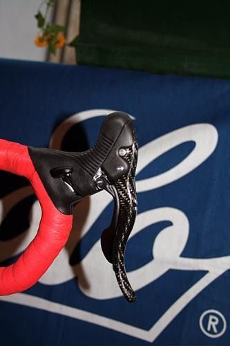 The inside of the Ergopower lever retains the thumb lever for multiple shifts.
