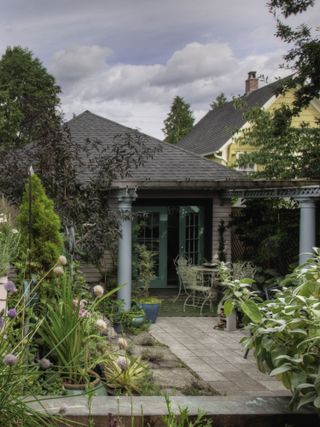 summerhouse in flower garden