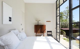 interior of the new rooms to rent at the modernist white painted and crips Fondation CAB in the south of France