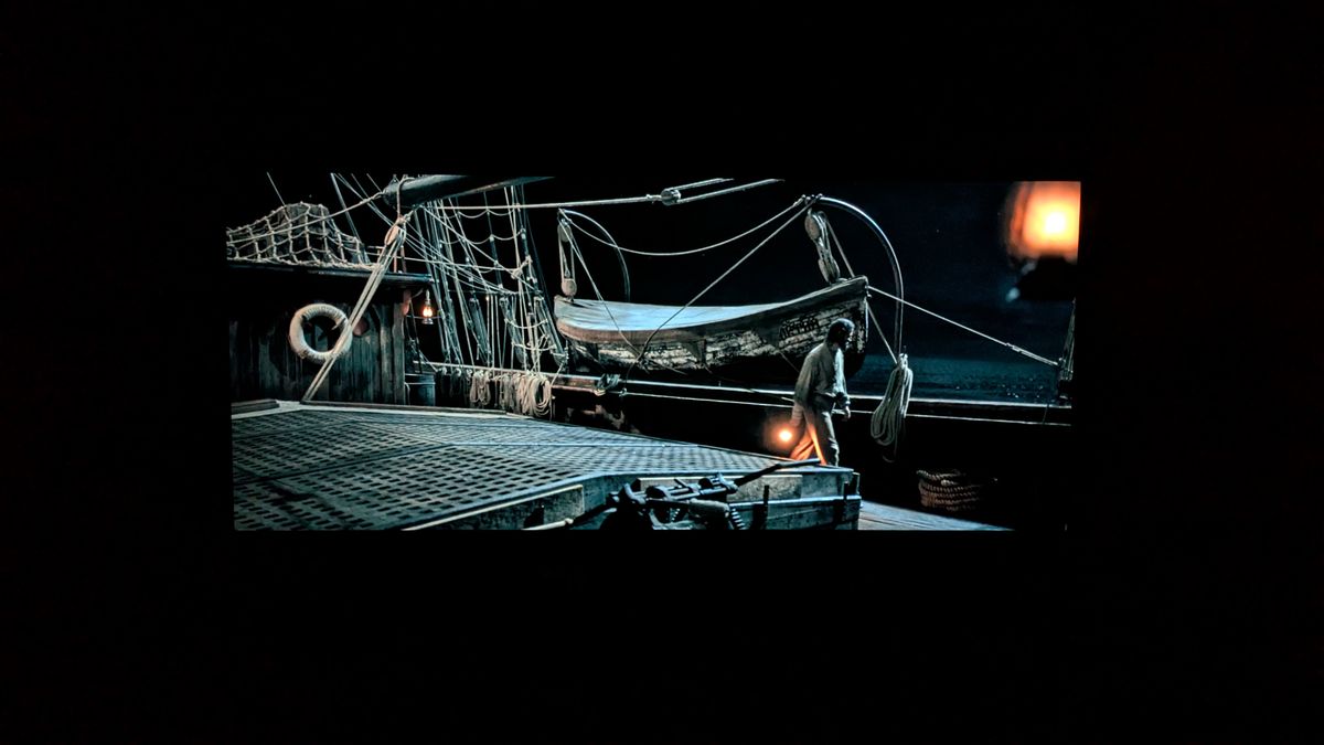 a shot of a man on deck from the last voyage of the demeter on LG G5 in Dolby Vision Filmmaker mode in a pitch black room