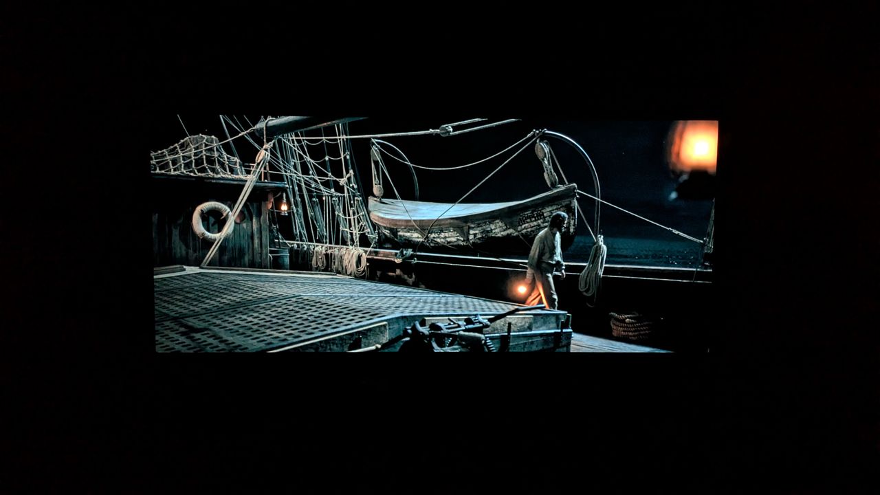 a shot of a man on deck from the last voyage of the demeter on LG G5 in Dolby Vision Filmmaker mode in a pitch black room