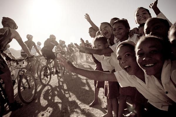School kids support the riders during stage three