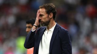 England manager Gareth Southgate reacts with disappointment during his side's World Cup exit to France in Qatar.